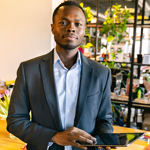 businessman holding a tablet