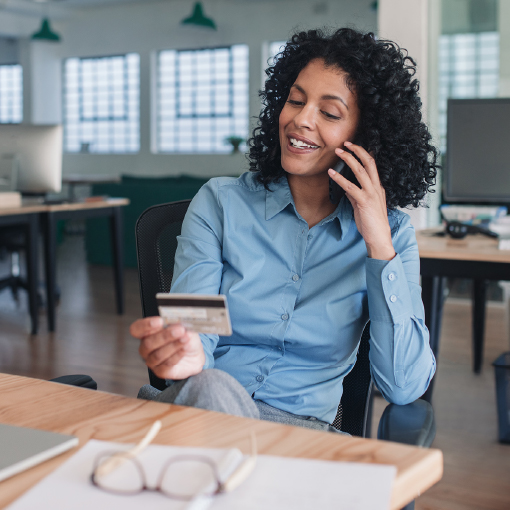 woman using her business credit card