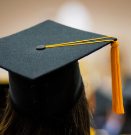 graduate wearing a black cap