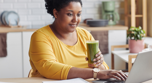 woman using laptop at home