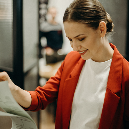 businesswoman looking through a contract