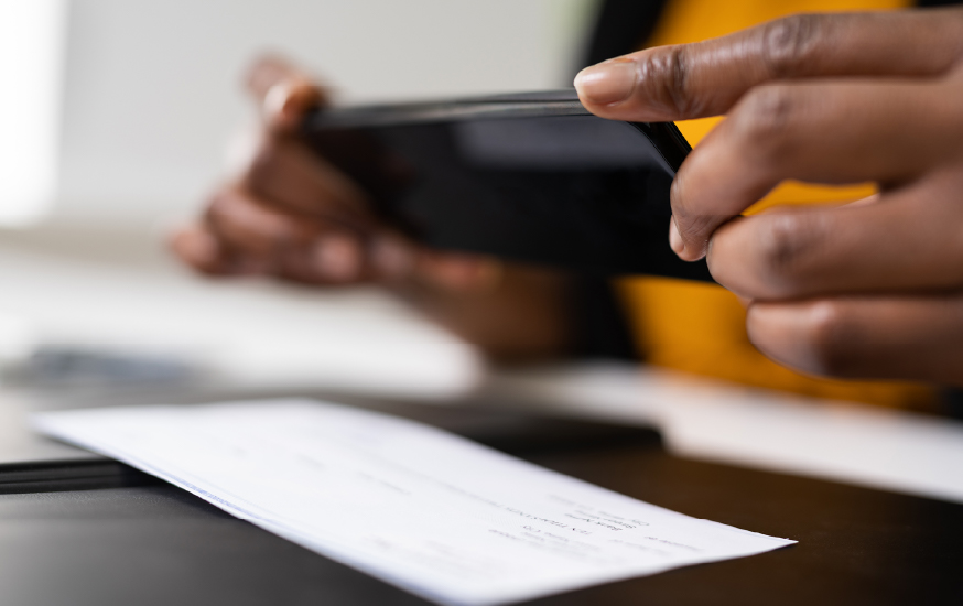 person making a mobile deposit